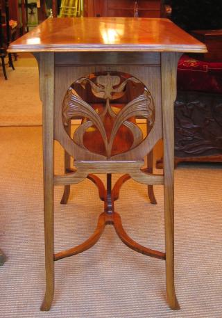 Art Nouveau walnut table.